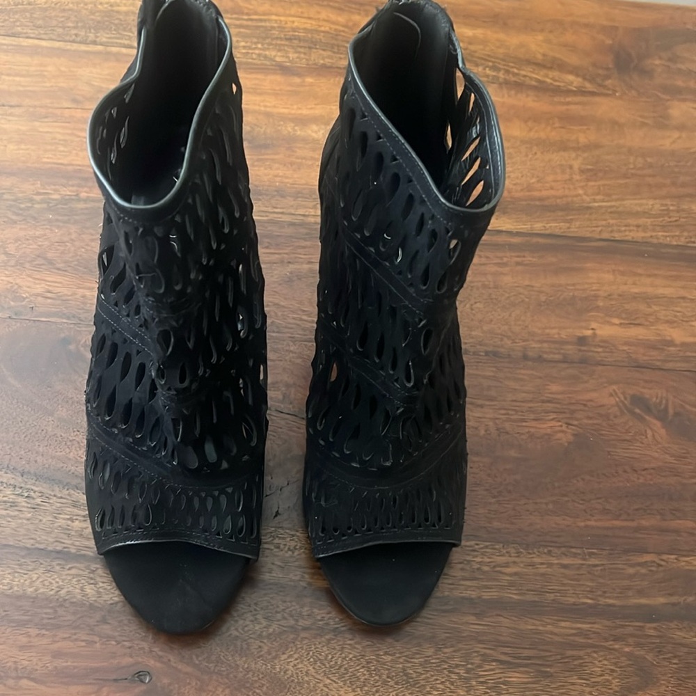 Black suede high heel sexy sandals. Absolutely beautiful on. Size 8.New with tag